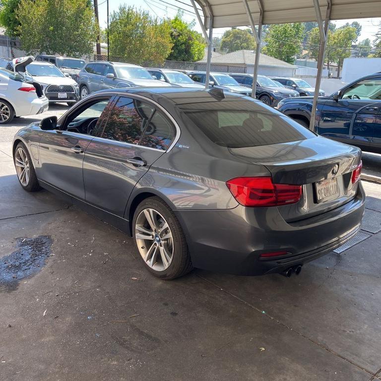 used 2018 BMW 330e car, priced at $14,056