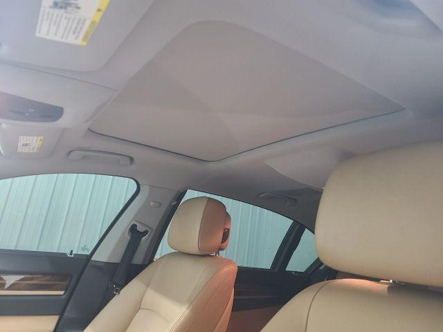 used 2014 BMW 740 car, priced at $15,995