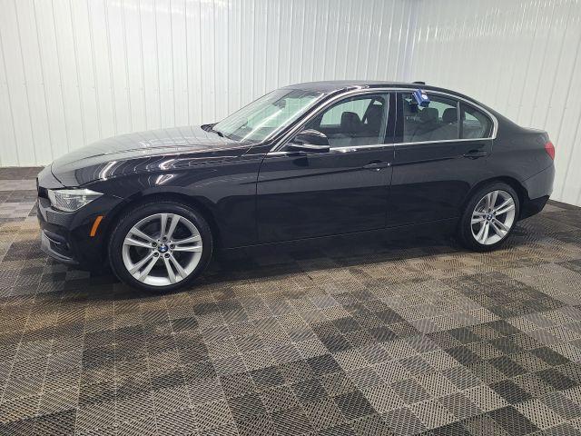 used 2018 BMW 330 car, priced at $16,777