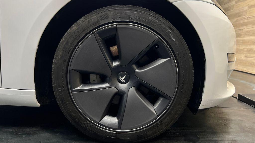 used 2023 Tesla Model 3 car, priced at $22,341