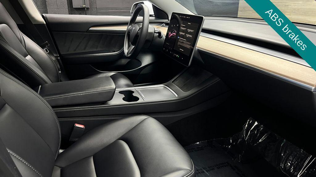 used 2023 Tesla Model 3 car, priced at $22,341