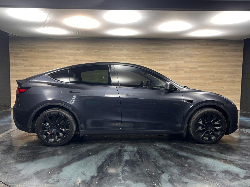 used 2024 Tesla Model Y car, priced at $30,871