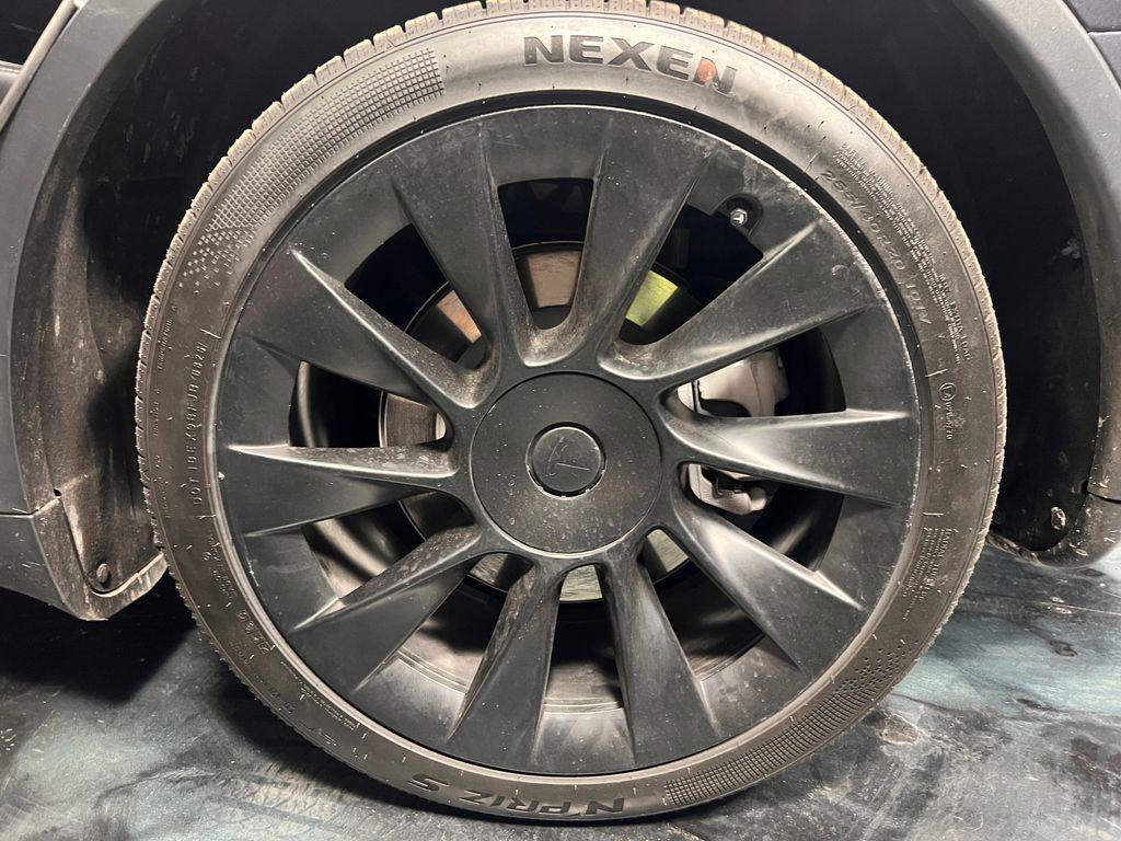 used 2024 Tesla Model Y car, priced at $30,871