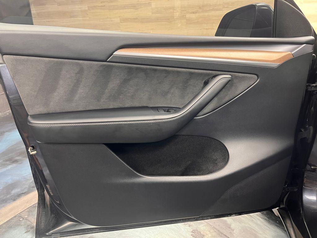 used 2024 Tesla Model Y car, priced at $30,871