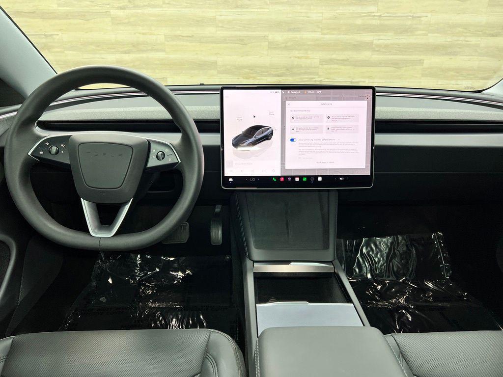 used 2025 Tesla Model 3 car, priced at $32,731