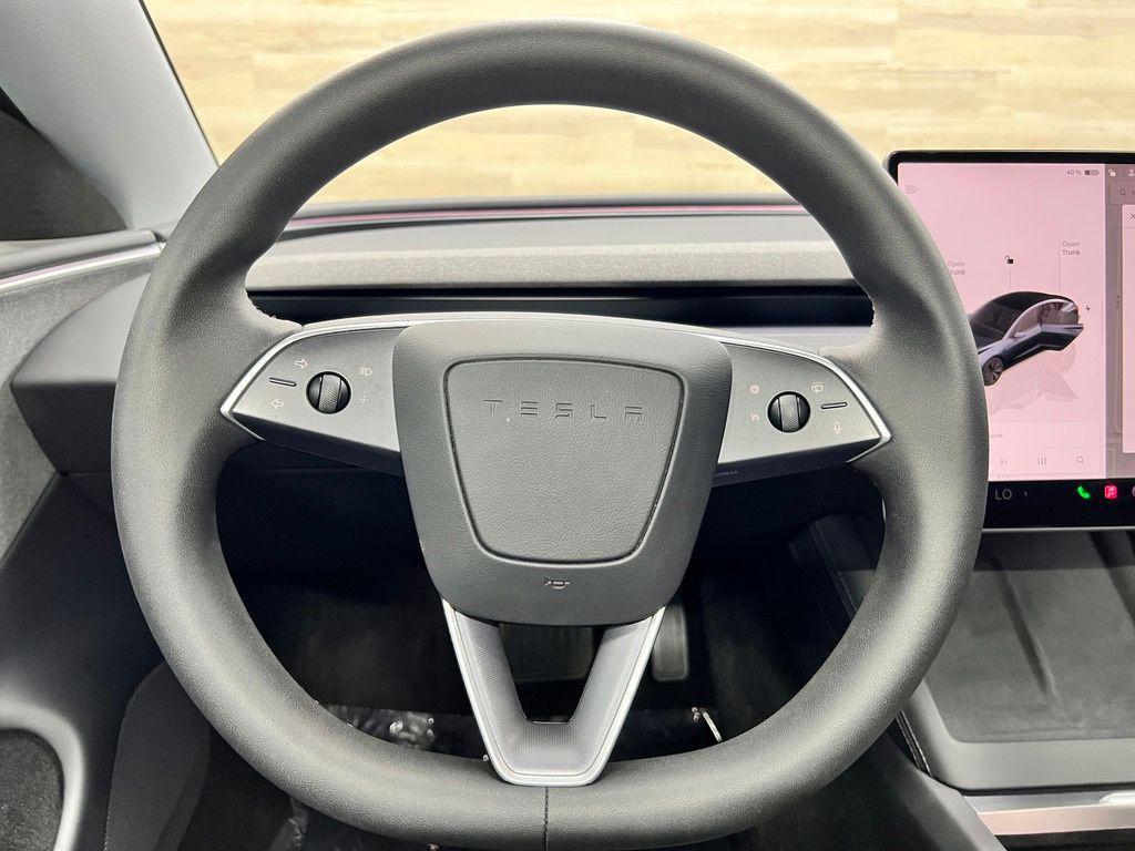 used 2025 Tesla Model 3 car, priced at $32,731
