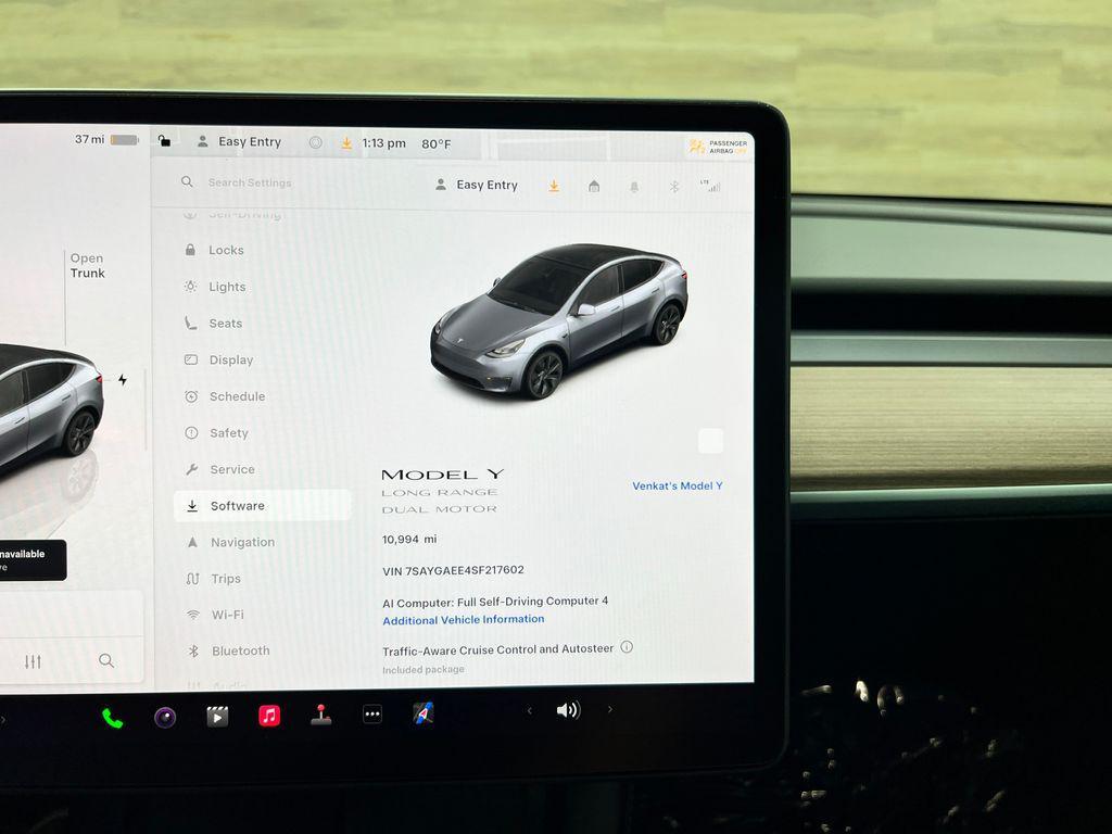 used 2025 Tesla Model Y car, priced at $34,741