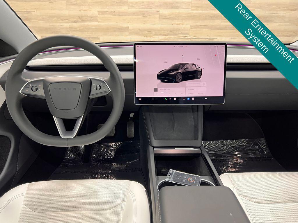 used 2025 Tesla Model 3 car, priced at $34,871