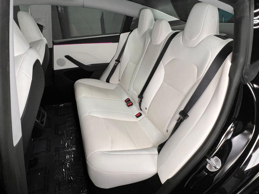used 2025 Tesla Model 3 car, priced at $34,871
