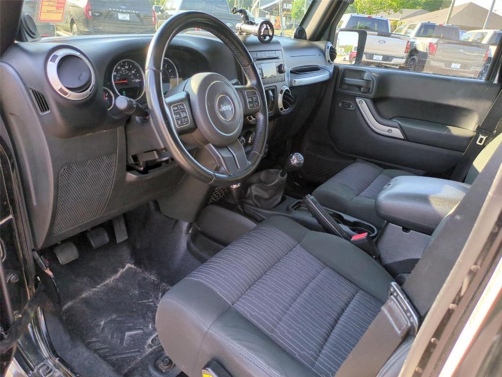 used 2012 Jeep Wrangler Unlimited car, priced at $18,494