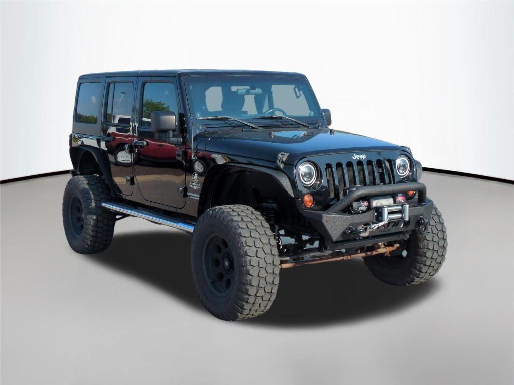 used 2012 Jeep Wrangler Unlimited car, priced at $18,494
