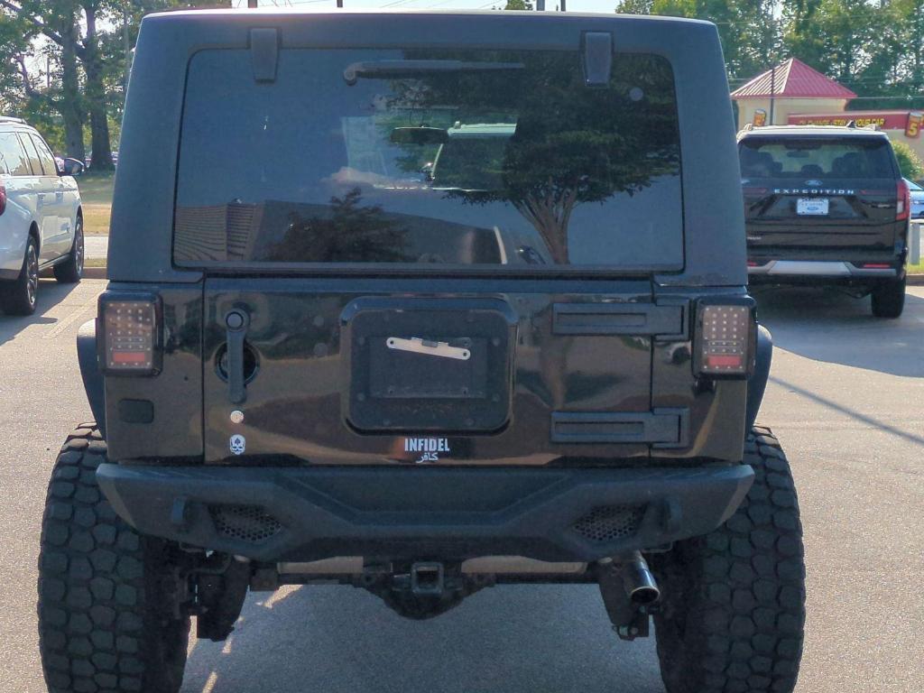 used 2012 Jeep Wrangler Unlimited car, priced at $18,494