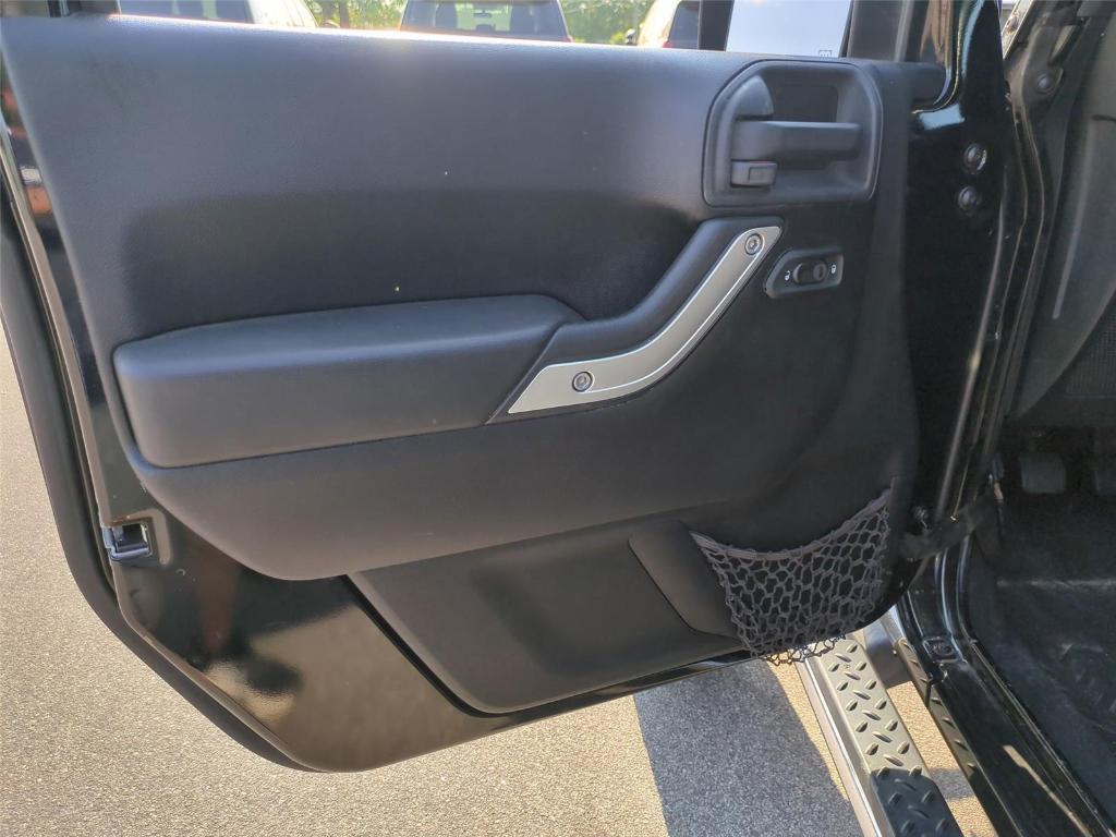 used 2012 Jeep Wrangler Unlimited car, priced at $18,494
