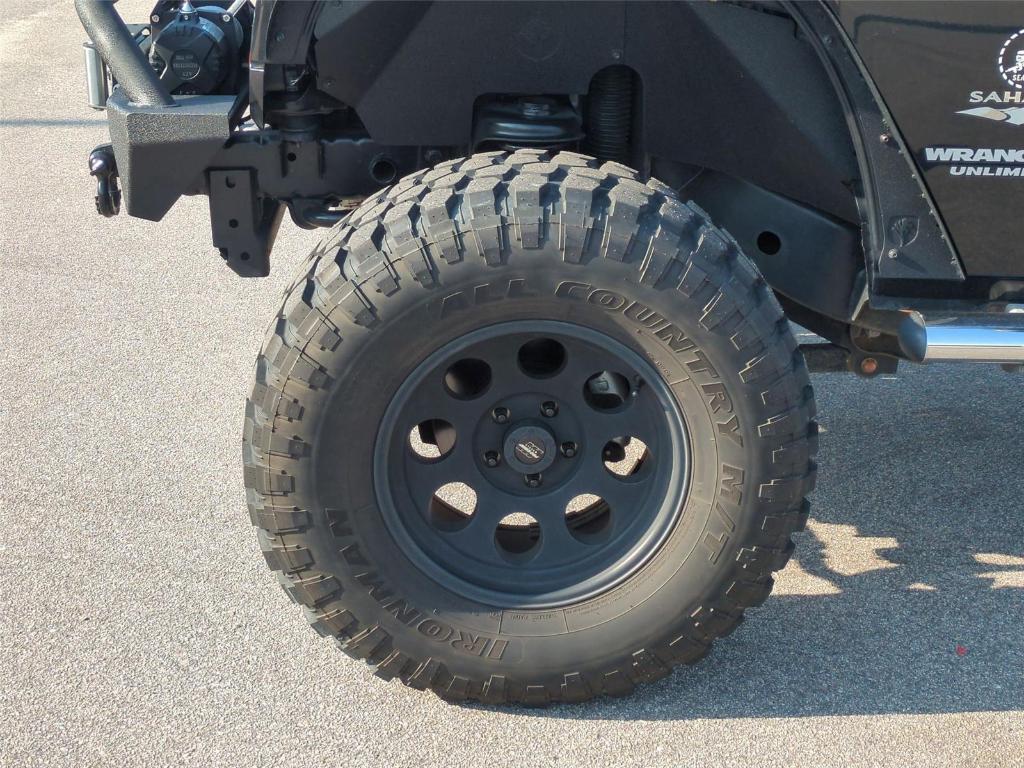 used 2012 Jeep Wrangler Unlimited car, priced at $18,494