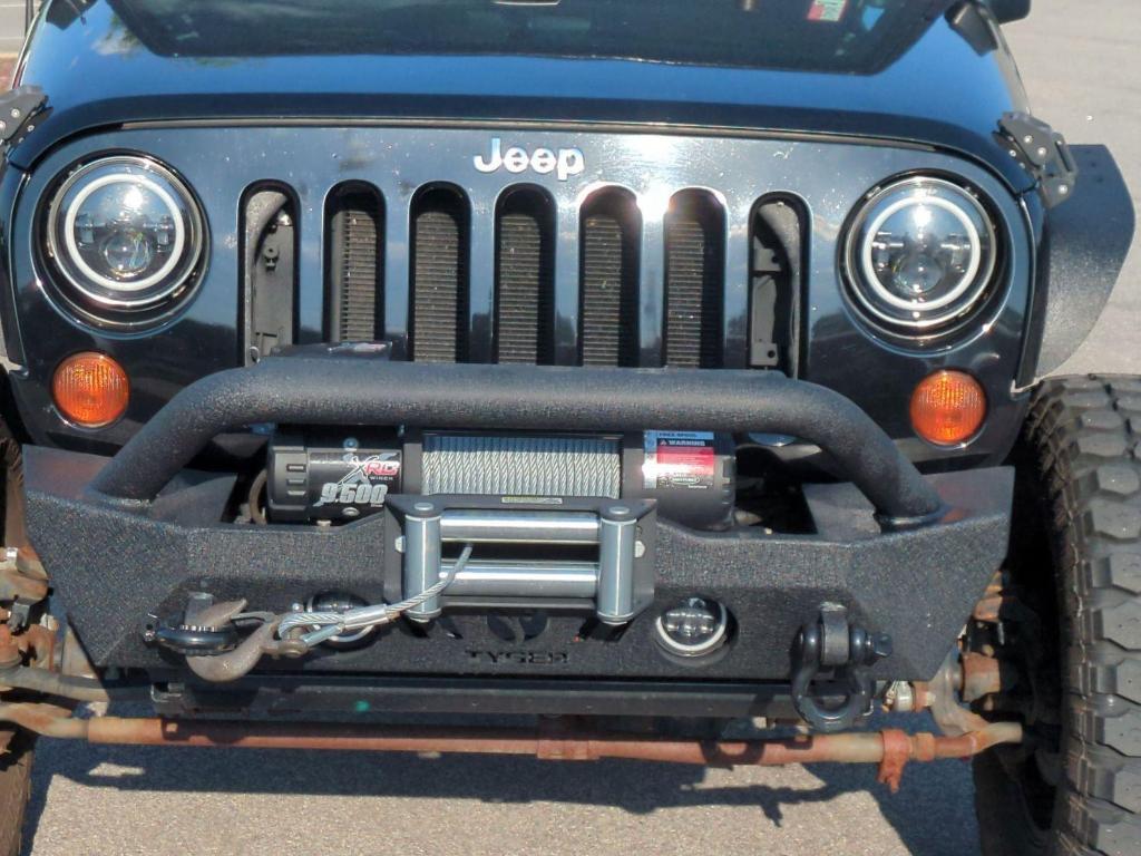 used 2012 Jeep Wrangler Unlimited car, priced at $18,494