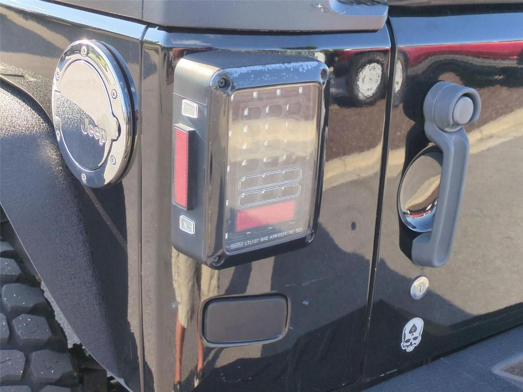 used 2012 Jeep Wrangler Unlimited car, priced at $18,494
