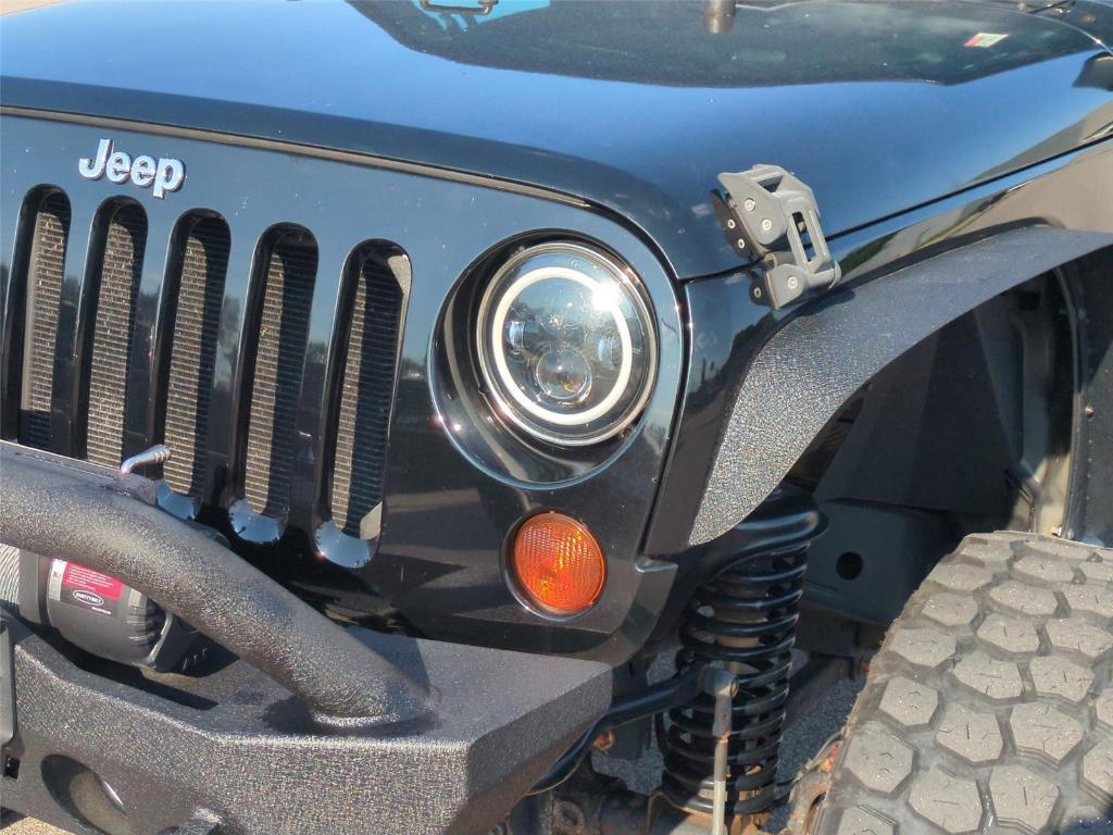 used 2012 Jeep Wrangler Unlimited car, priced at $18,494