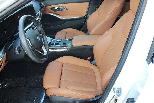 used 2023 BMW 330e car, priced at $31,498