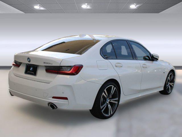 used 2023 BMW 330e car, priced at $31,498
