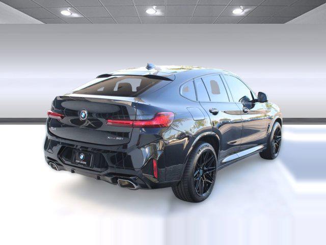 used 2025 BMW X4 car, priced at $49,998