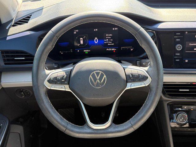 used 2023 Volkswagen Taos car, priced at $19,699