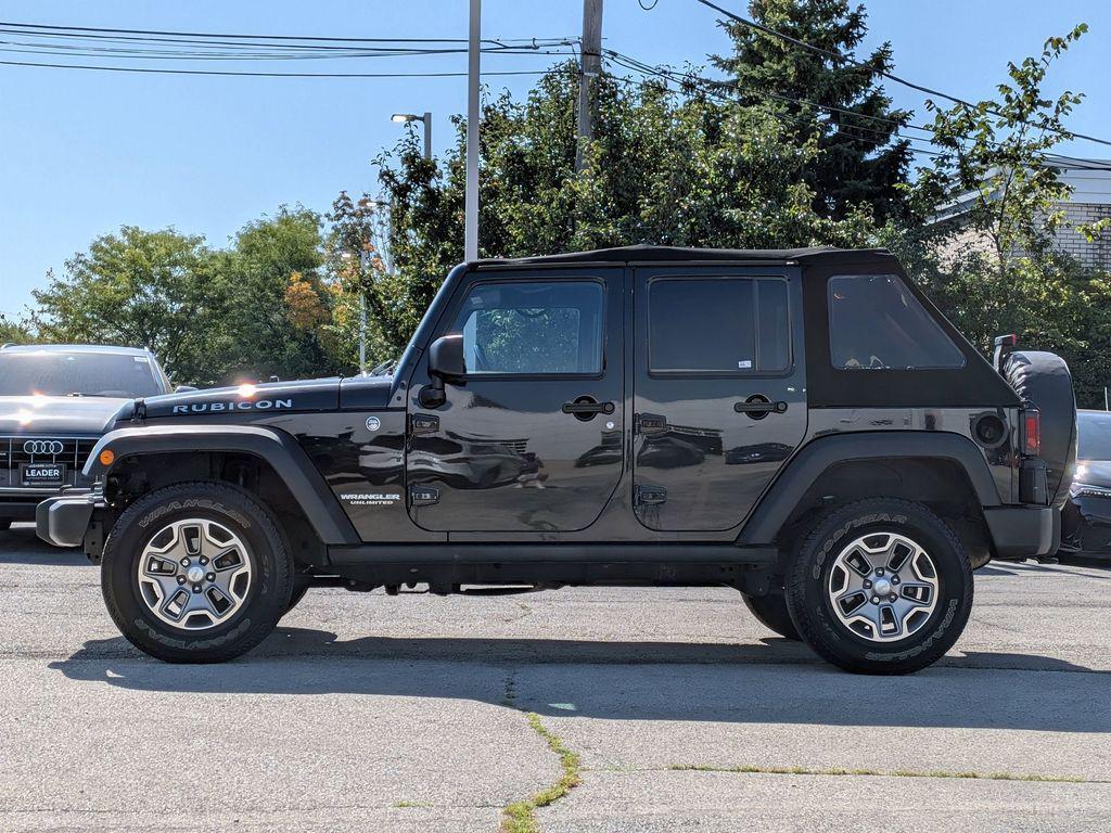 used 2014 Jeep Wrangler Unlimited car, priced at $13,995