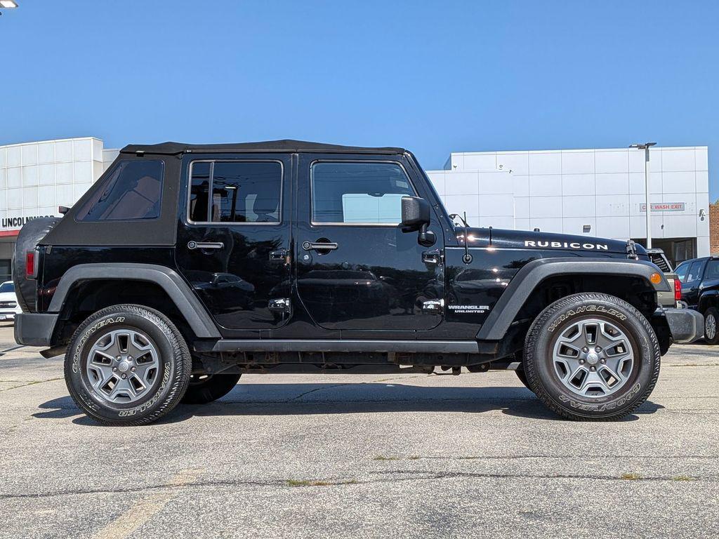 used 2014 Jeep Wrangler Unlimited car, priced at $13,995