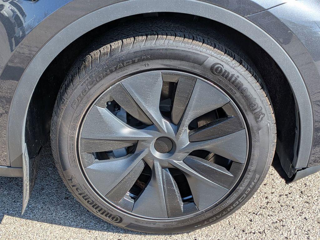 used 2025 Tesla Model Y car, priced at $39,595