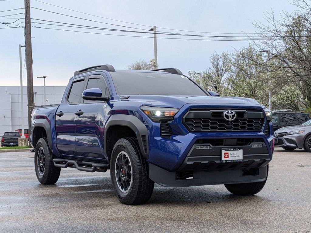 used 2025 Toyota Tacoma Hybrid car, priced at $50,595