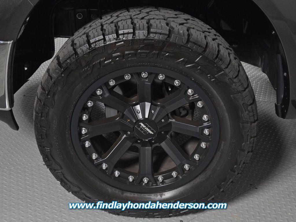 used 2018 Ram 1500 car, priced at $21,483