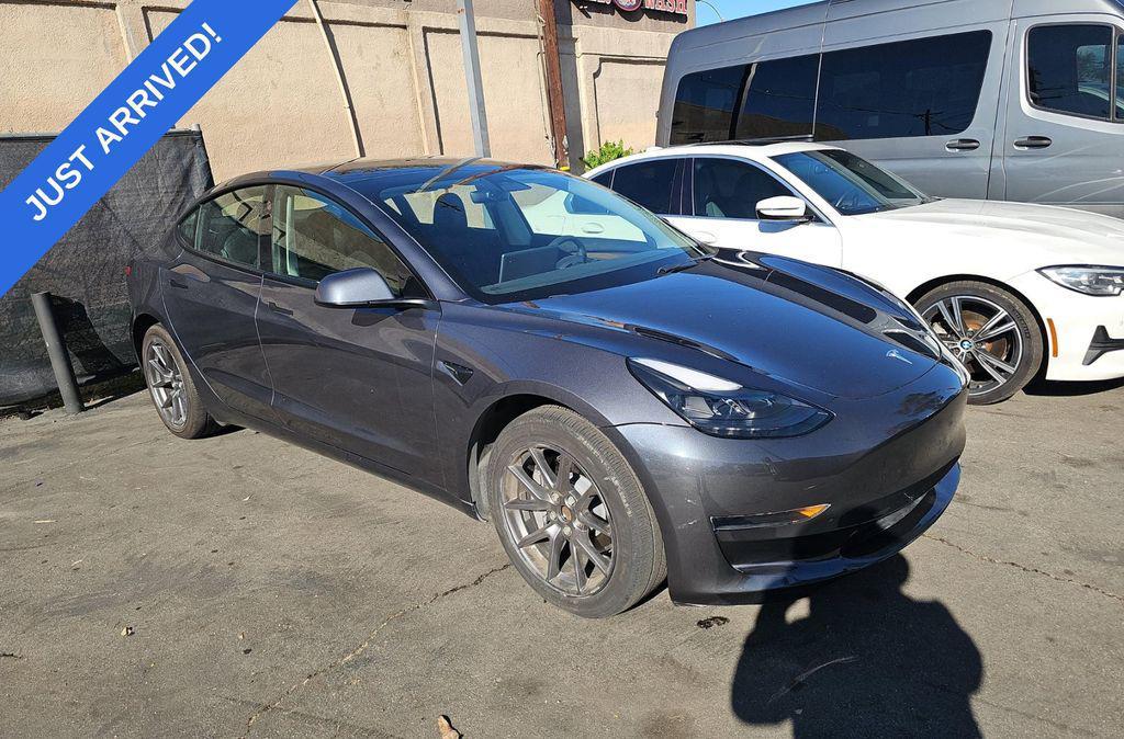 used 2023 Tesla Model 3 car, priced at $27,995