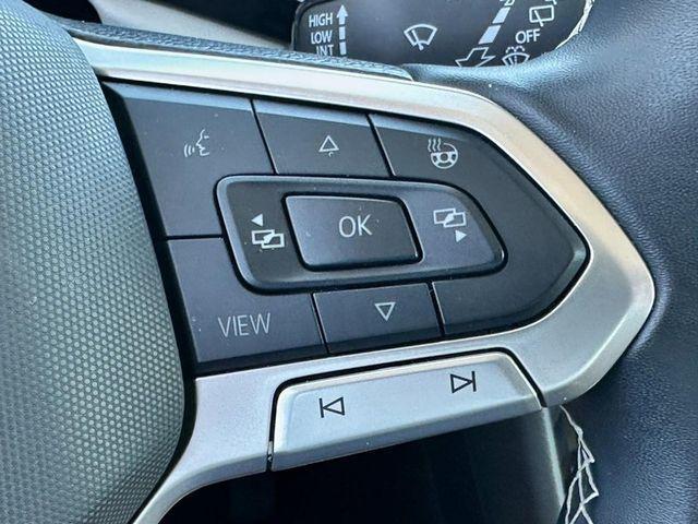 used 2024 Volkswagen Taos car, priced at $18,712