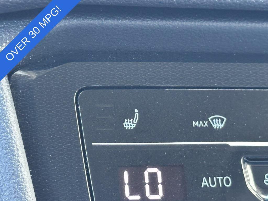 used 2025 Volkswagen Taos car, priced at $23,000