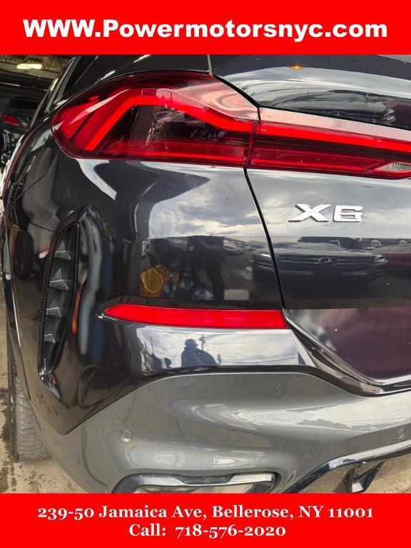 used 2023 BMW X6 car, priced at $44,170