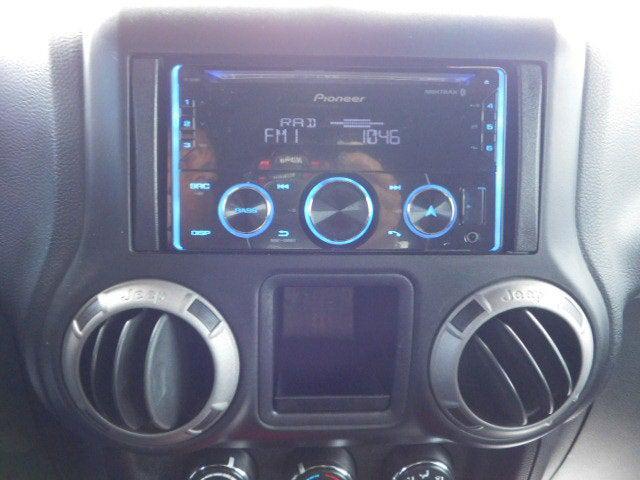 used 2013 Jeep Wrangler Unlimited car, priced at $13,877