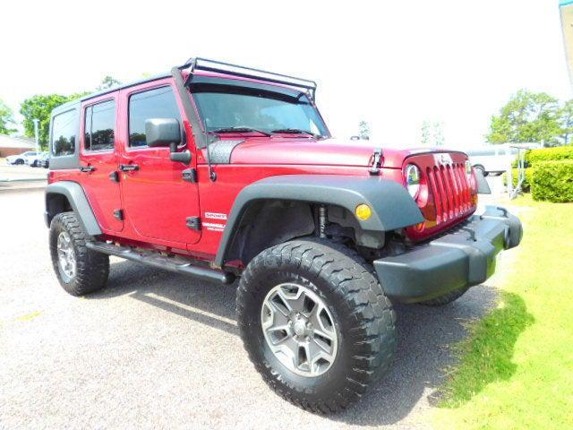 used 2013 Jeep Wrangler Unlimited car, priced at $13,877
