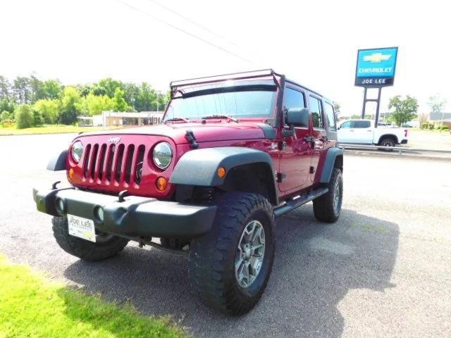 used 2013 Jeep Wrangler Unlimited car, priced at $13,877