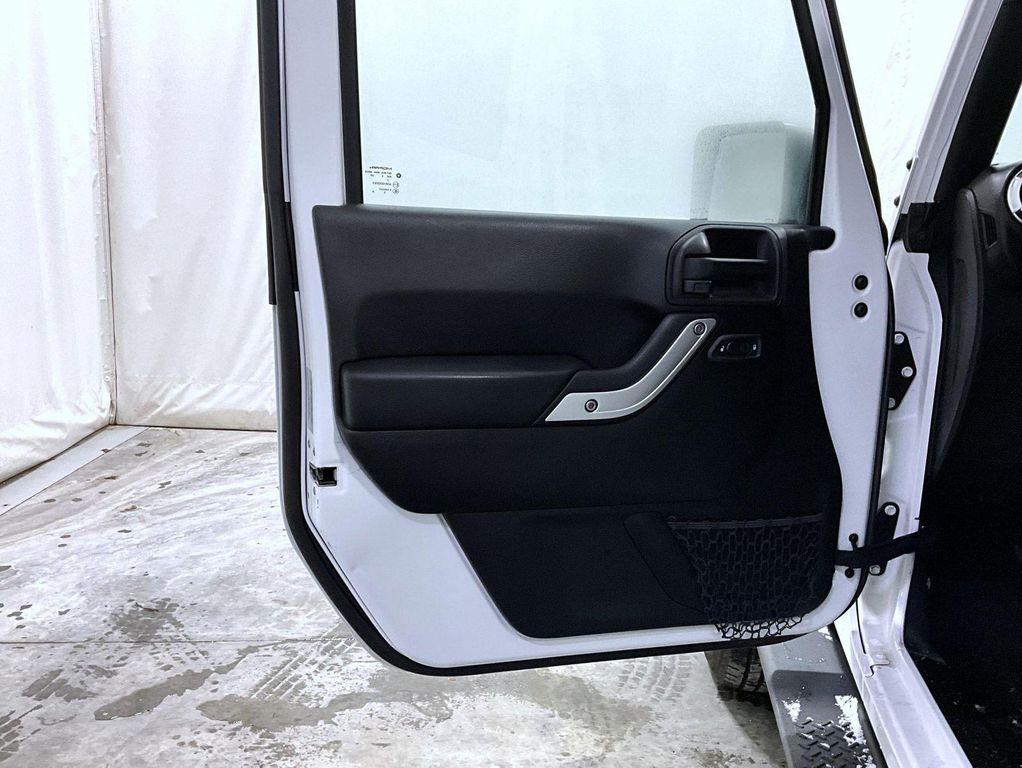 used 2015 Jeep Wrangler Unlimited car, priced at $19,071