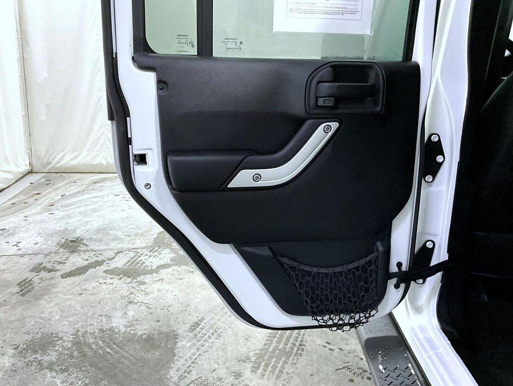 used 2015 Jeep Wrangler Unlimited car, priced at $19,071