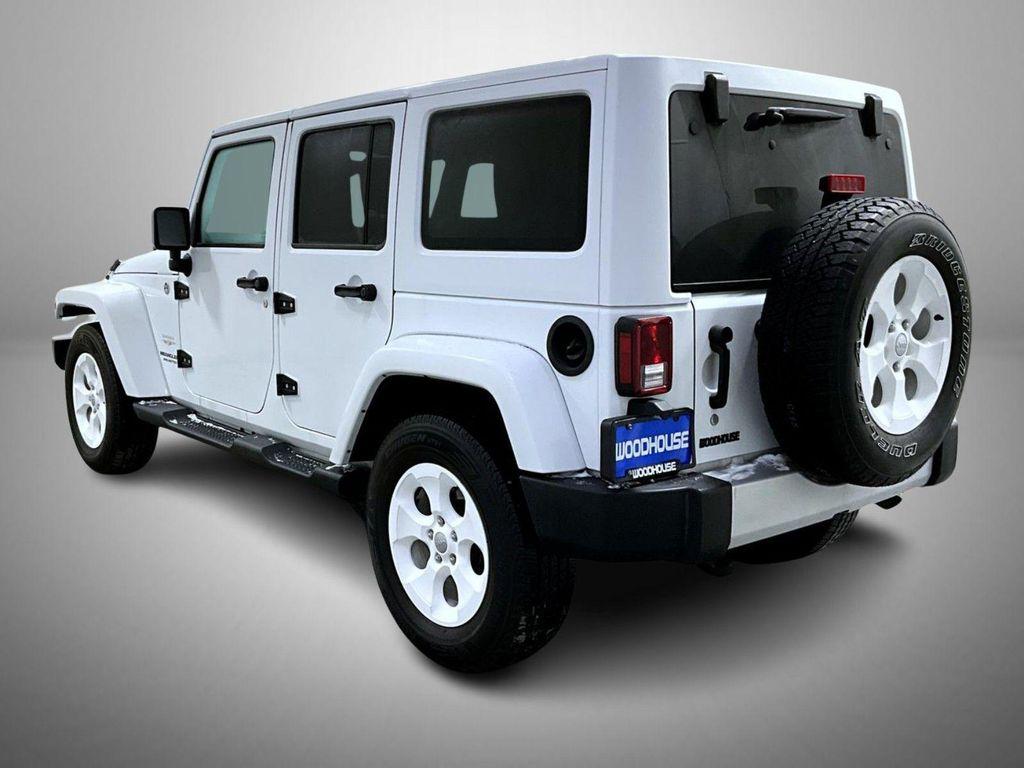 used 2015 Jeep Wrangler Unlimited car, priced at $19,071