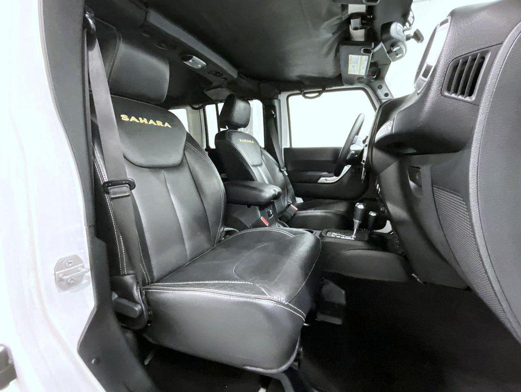 used 2015 Jeep Wrangler Unlimited car, priced at $19,071