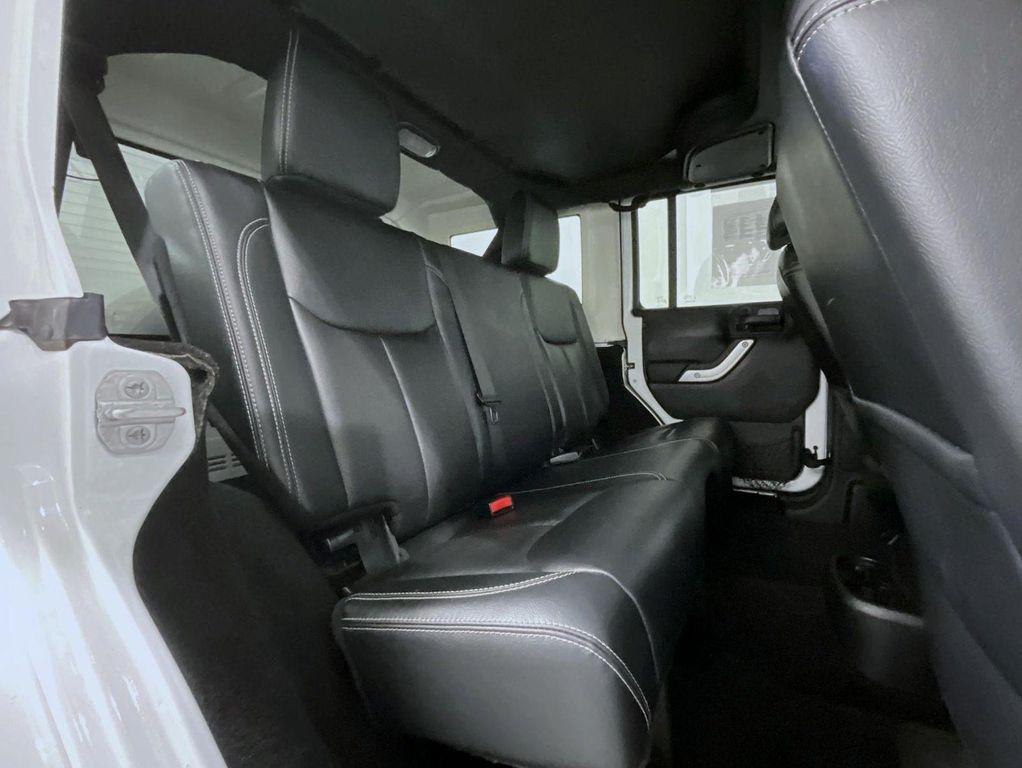 used 2015 Jeep Wrangler Unlimited car, priced at $19,071