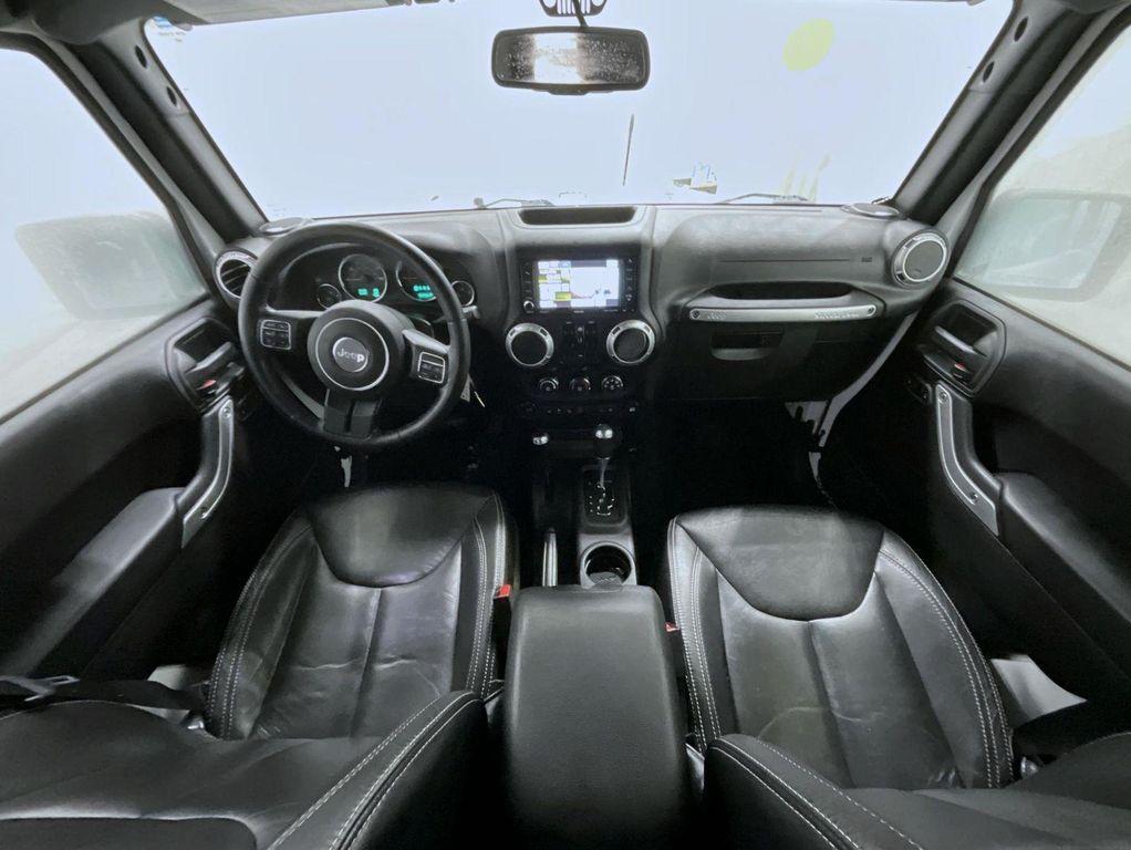 used 2015 Jeep Wrangler Unlimited car, priced at $19,071