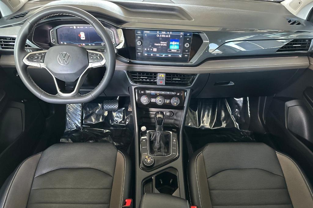used 2022 Volkswagen Taos car, priced at $18,999