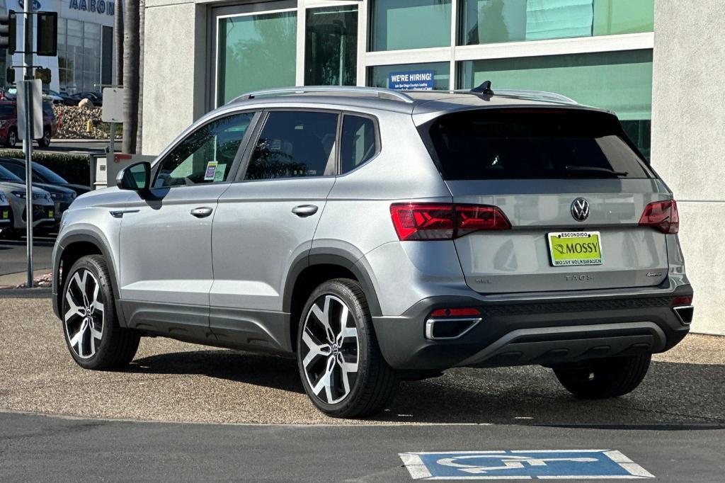 used 2022 Volkswagen Taos car, priced at $18,999