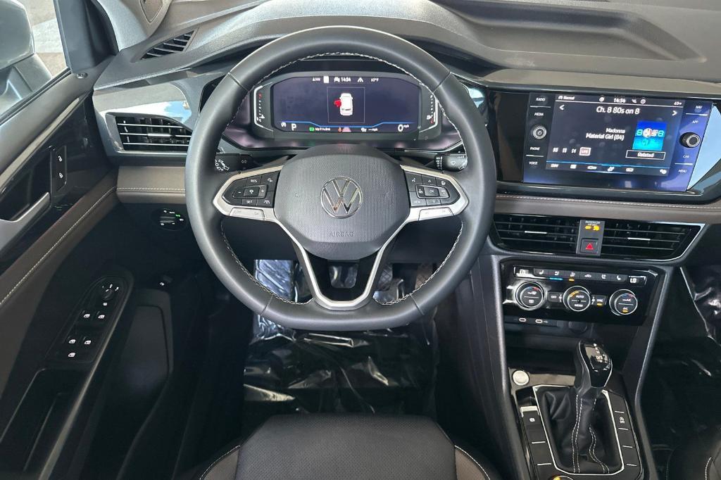 used 2022 Volkswagen Taos car, priced at $18,999