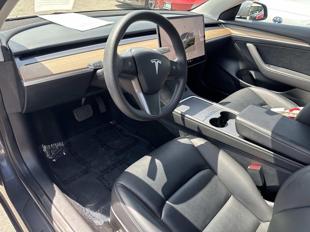 used 2023 Tesla Model 3 car, priced at $25,889