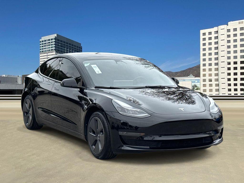 used 2023 Tesla Model 3 car, priced at $20,695