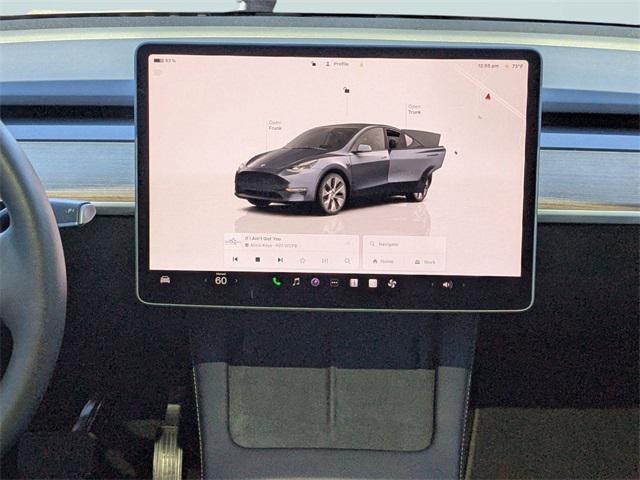 used 2023 Tesla Model Y car, priced at $31,000