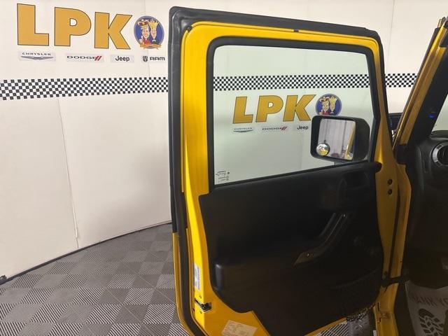 used 2015 Jeep Wrangler Unlimited car, priced at $13,994